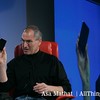 Steve holds up an iPhone